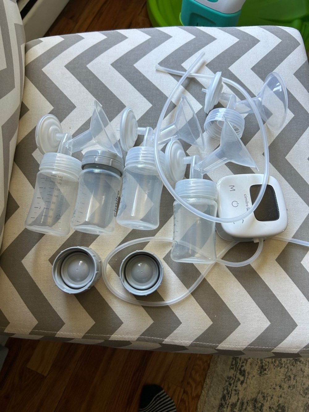 Electric Double Breast Pump with Clear Bottles and White Motor